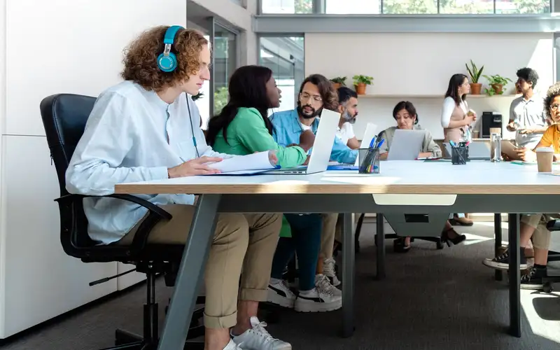 A group of learners at laptops